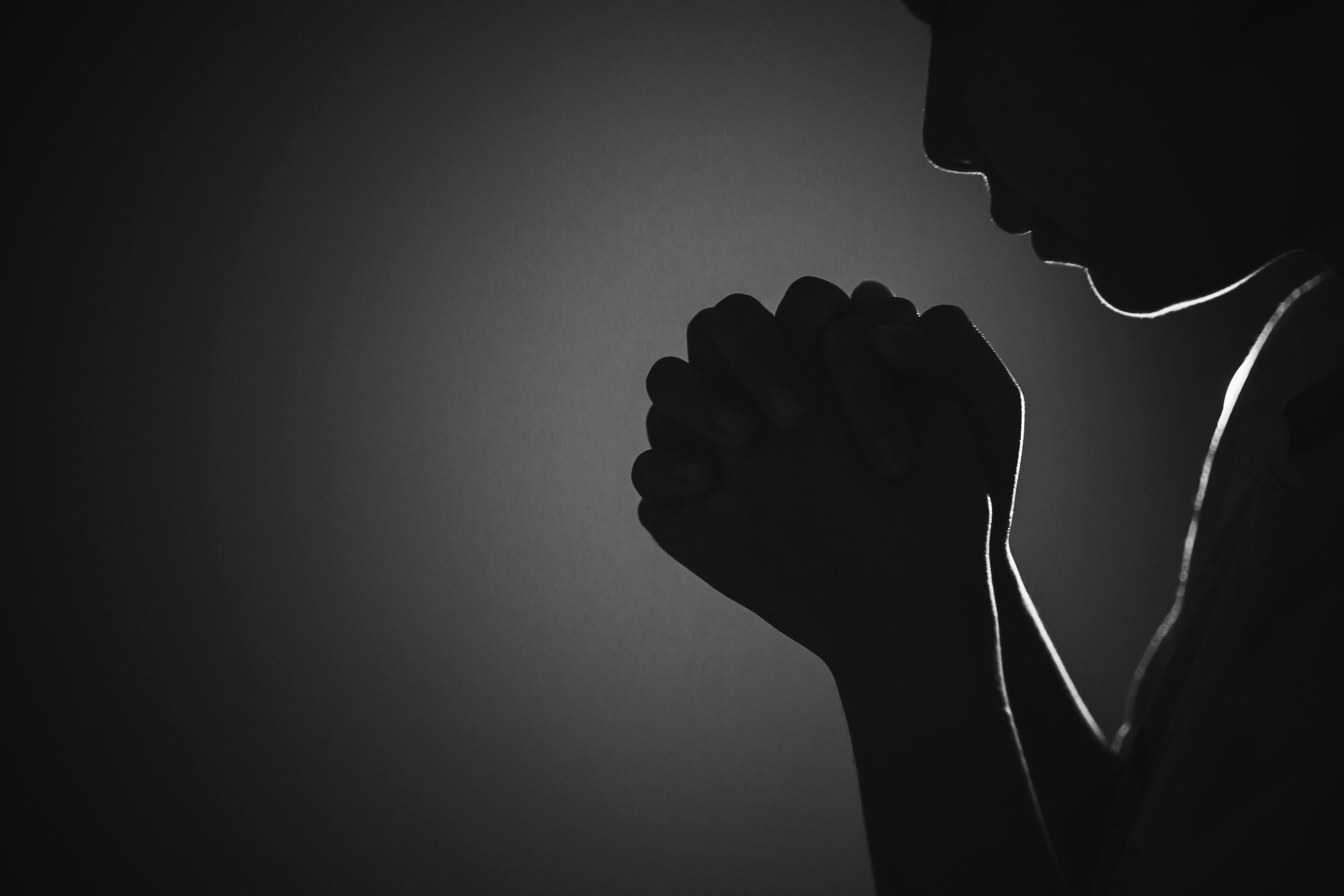 Black and white prayer hands